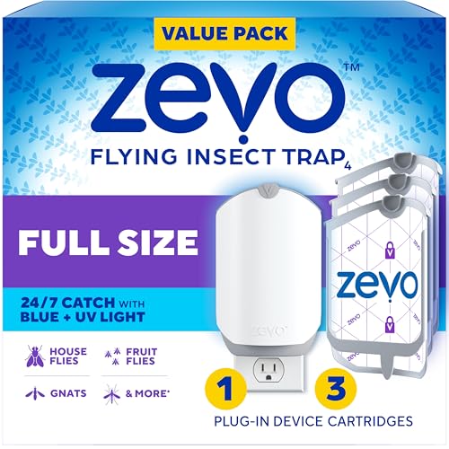 Plug-in light fly trap with sticky cartridge for an indoor kitchen counter