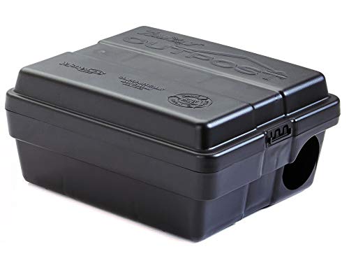 Set of six lockable tamper-resistant rat bait stations placed along an exterior wall