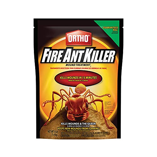 Fire ant mound treatment granules applied to a single mound in a lawn